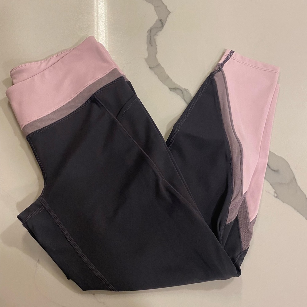 Tangerine multicolored leggings with side pockets. Never worn with tags